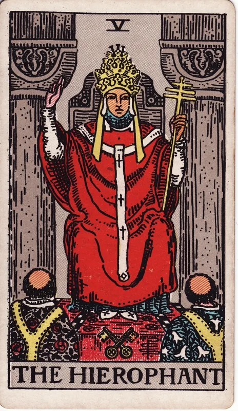 The Hierophant tarot card from the Rider-Waite deck (1909, public domain)