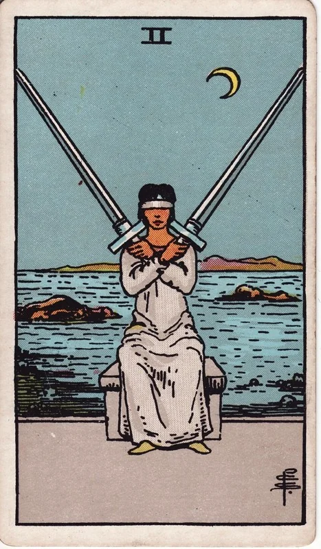 Two of Swords tarot card from the Rider-Waite deck (1909, public domain)