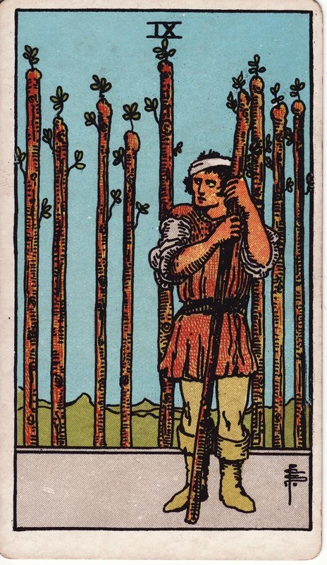 Nine of Wands tarot card from the Rider-Waite deck (1909, public domain)